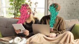 Couple using devices with surreal painted faces